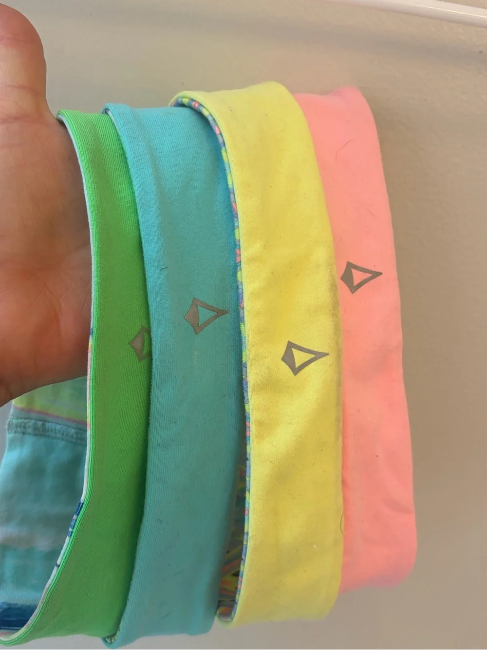 Kids Stretchy Reflective Logo Headbands - reversible Aviva set of four